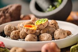 Heap of shriveled potatoes on plate