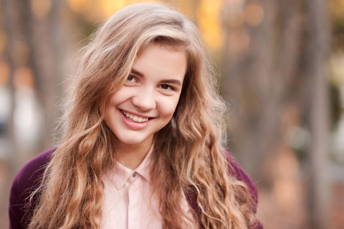 Portrait of smiling teenage girl outdoor