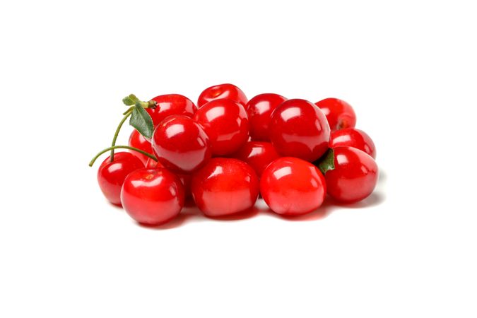 Fresh red cherry isolated on plain background