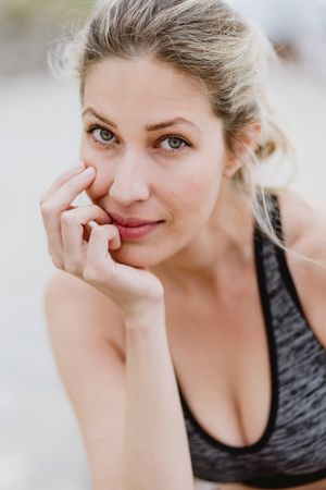 Sportswoman in active clothing smiling