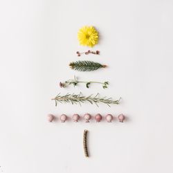 Christmas tree made of leaves and flowers