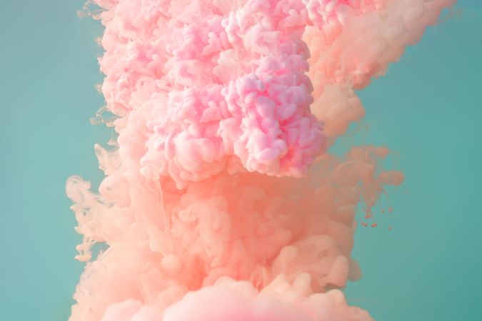 Cloud-like pastel pink color paint with teal background