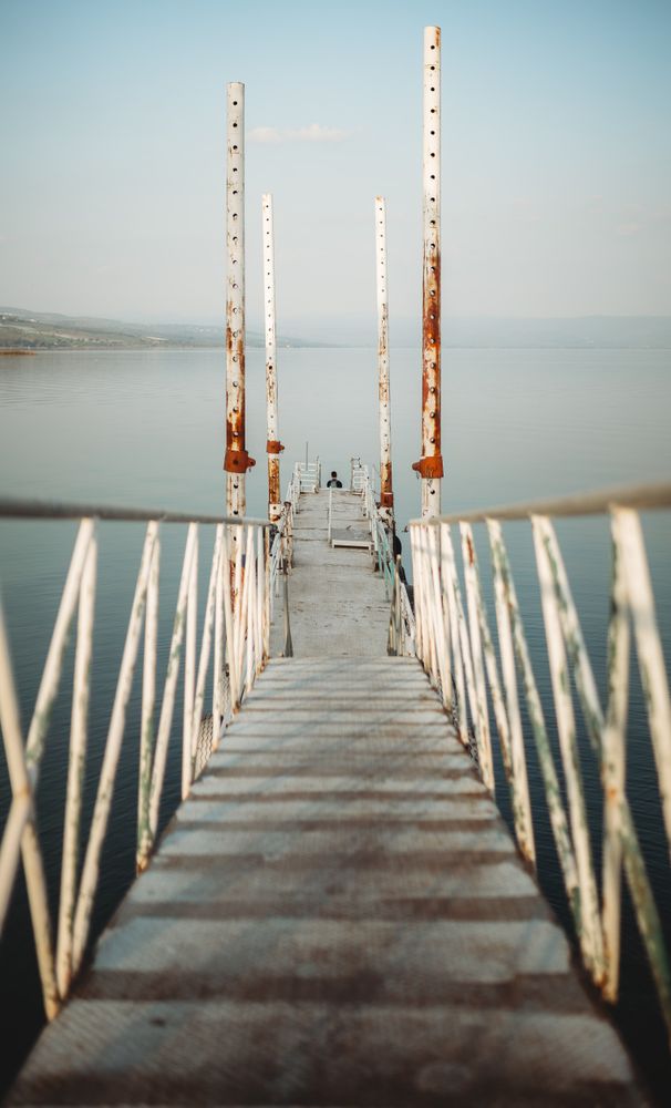 Rusty pier near calm sea