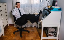 Man teleworking wearing shirt and tie