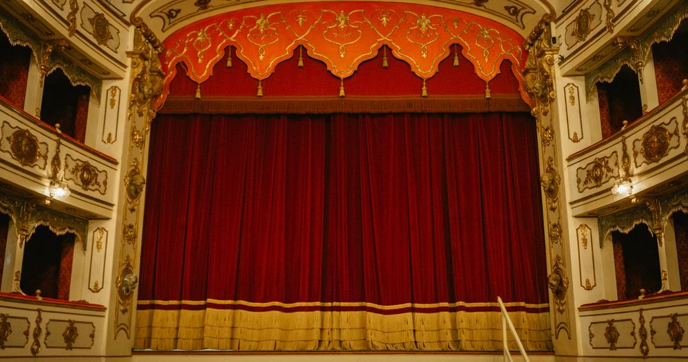 Well-lit Opera House with Beautiful Golden Decorations Ready to Recieve Audience for a Play or Ballet Show