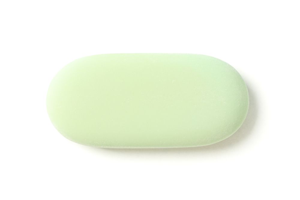 Color eraser with space for text isolated on studio background, top view