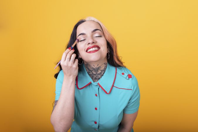 Woman Applying eye shadow