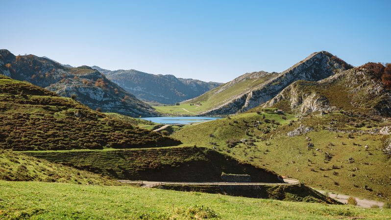 Landscape with lake between mountains