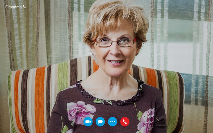 Video call screen with mature woman