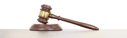 Gavel Resting on a Wooden Table