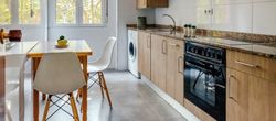 Kitchen interior with furniture and appliances