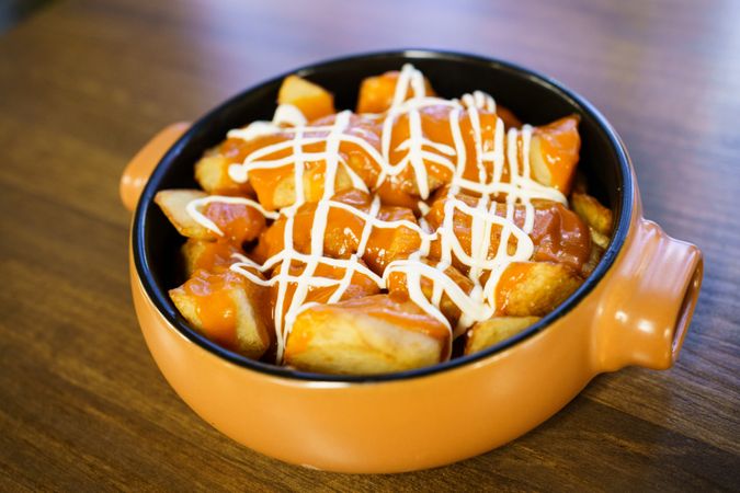 Delicious plate of patatas bravas