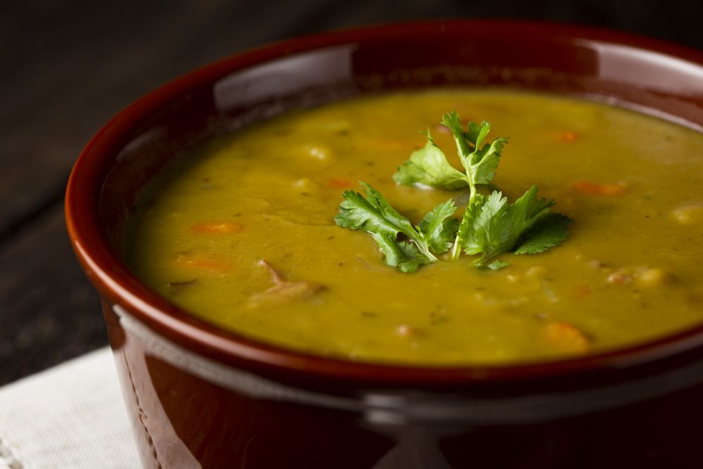 Pea soup. Bowl with pea soup on the table