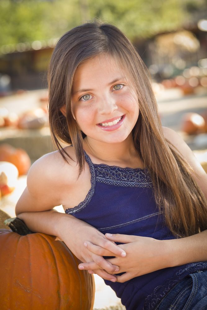 Preteen Girl Portrait at the Pumpkin Patch