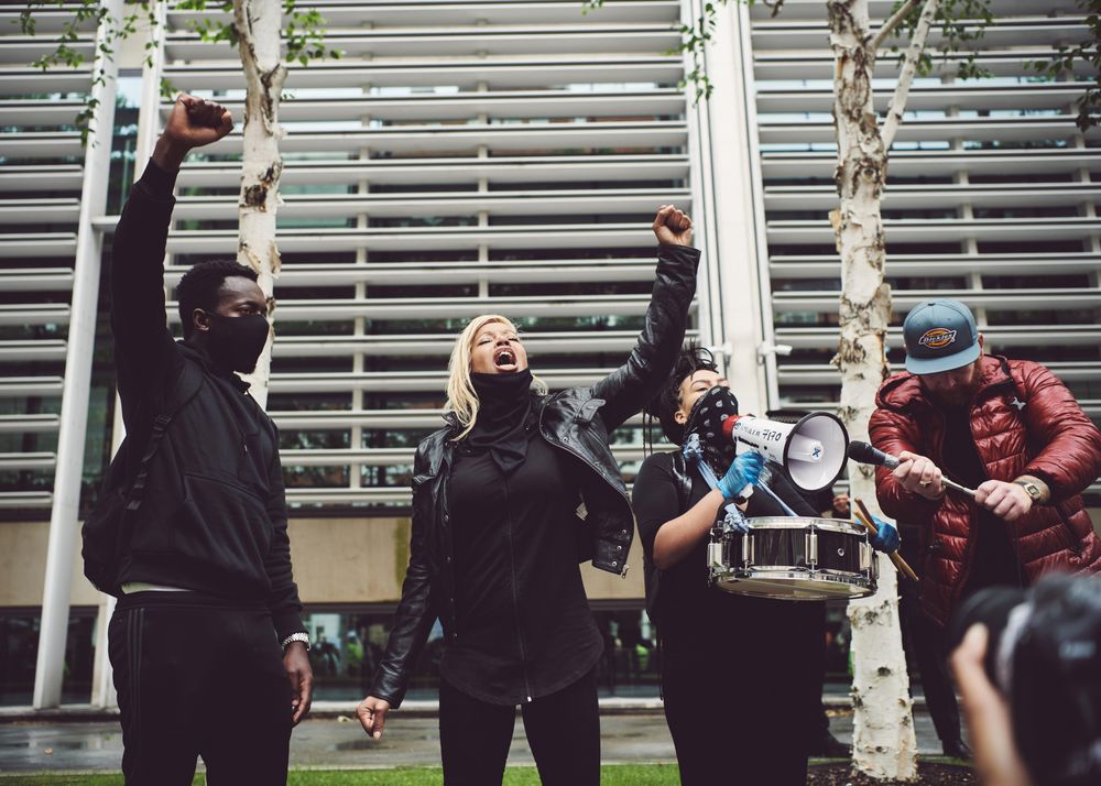 London, England, United Kingdom - June 6th, 2020: Group of people at BLM protest with raised fists