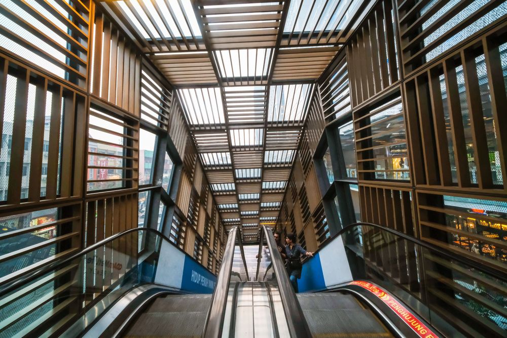 Escalator in a wooden hallway