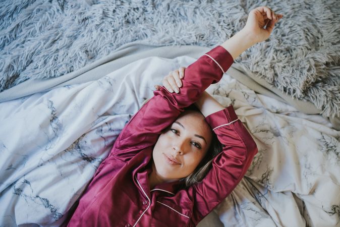 Woman and smiling in bed