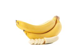 Banana cluster isolated on light background. Fresh fruit