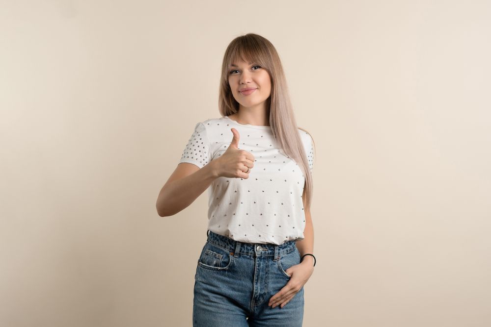 Woman showing okay gesture