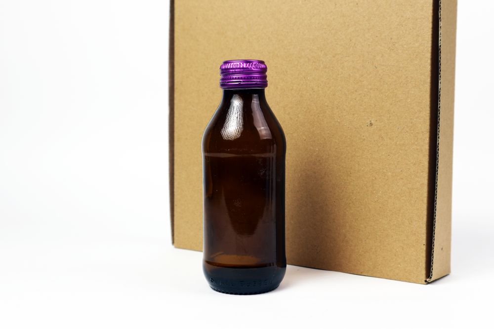 Brown bottle with box display product