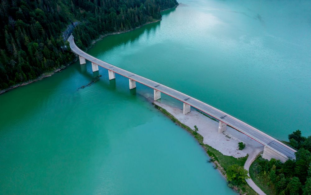 Drone aerial view of Lake Sylvenstein Bridge in the Upper Bavaria region, Germany