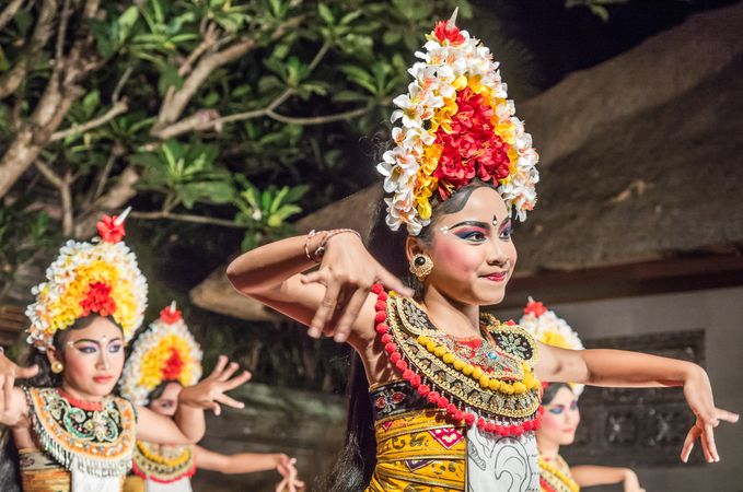 Bali, Indonesia - August, 15 2015: Indonesian girls dancing traditional dance