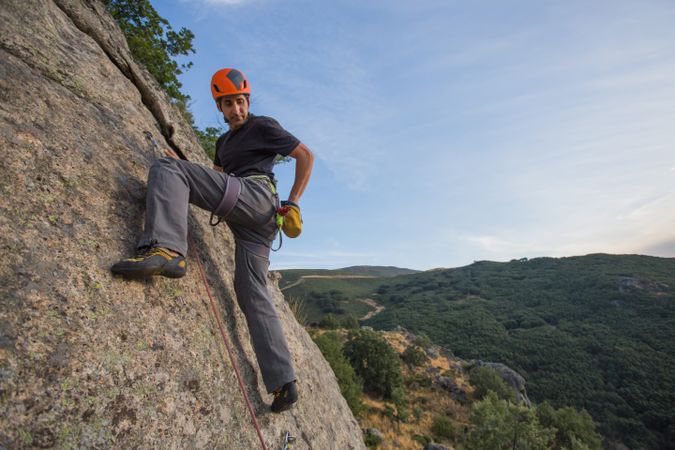 Man climbing a rock