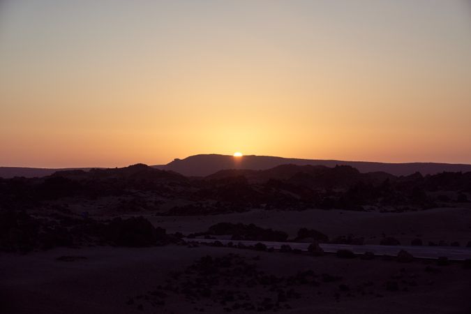 Sunset sky over mountainous area