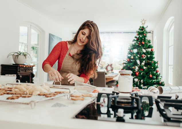 Woman baking cookies for Christmas