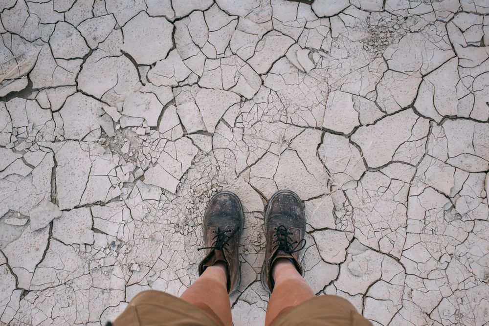 Boots on dry earth