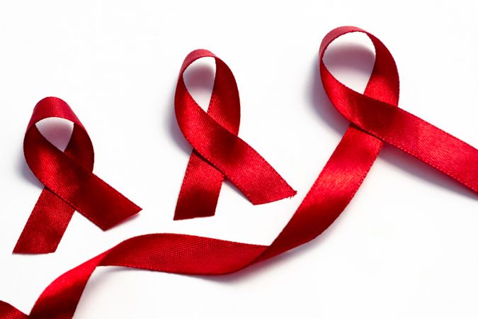 Red ribbons, HIV awareness concept, world AIDS day, world hypertension day, world cancer day with copy space