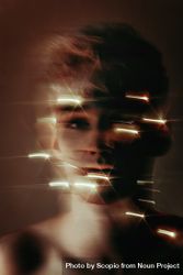 Blurry portrait of blonde young man with string light 5wKLA5