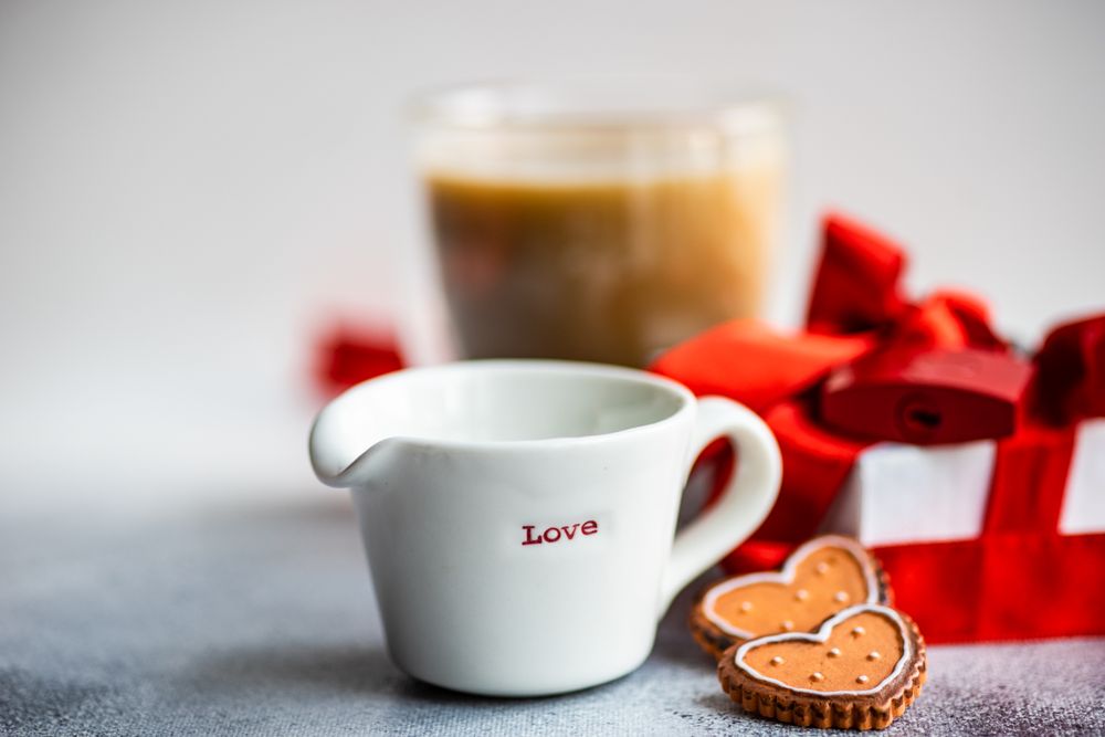 Creamer with the word "love" with cookies with space for text