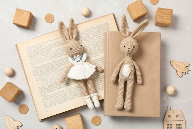 A children's book with toys on a light background.