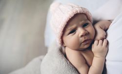 Baby girl looking at camera