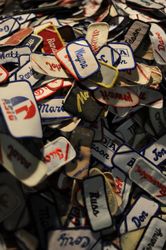 Pile of vintage iron on name patches