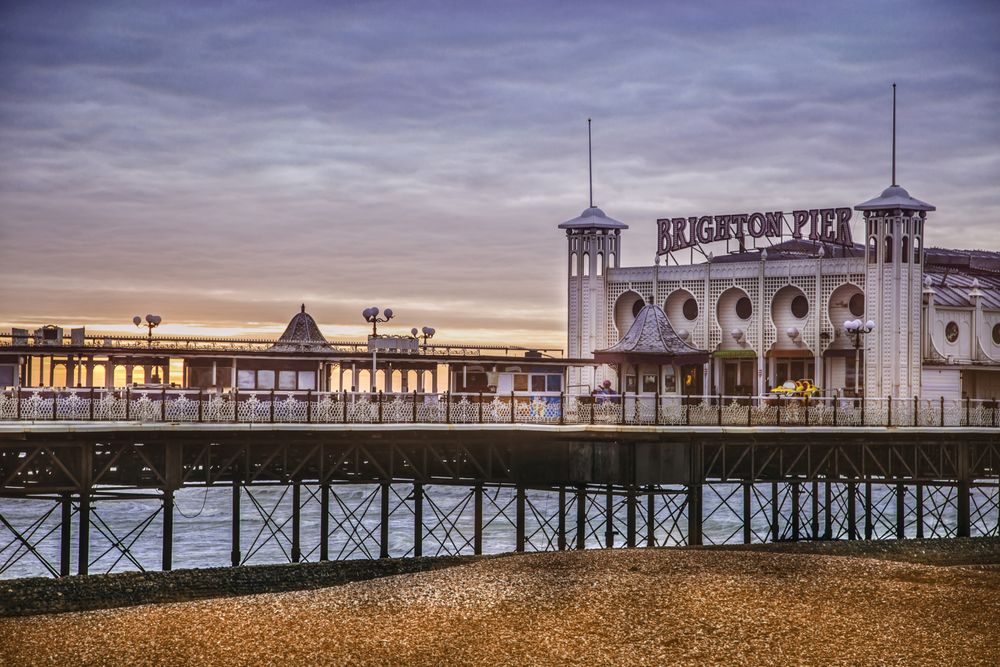Ornamental building on pier in evening