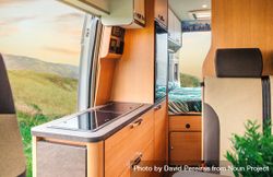 Inside of motorhome camper with door open to scenic view 49rKQb