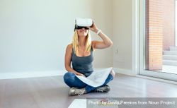 Woman watching with virtual reality glasses 49mPqE
