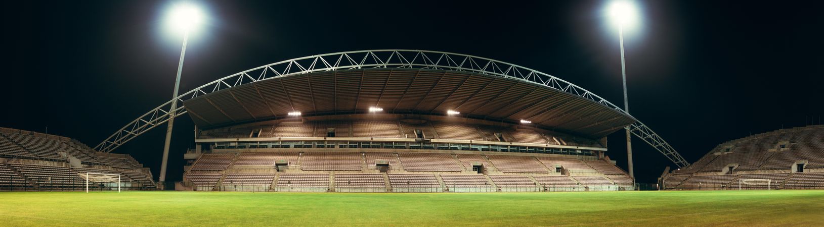 Huge empty football arena with lights
