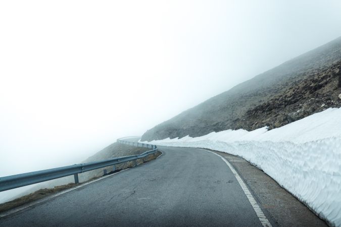 Road in foggy mountains