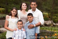 Happy Hispanic Family In the Park 49mqBW