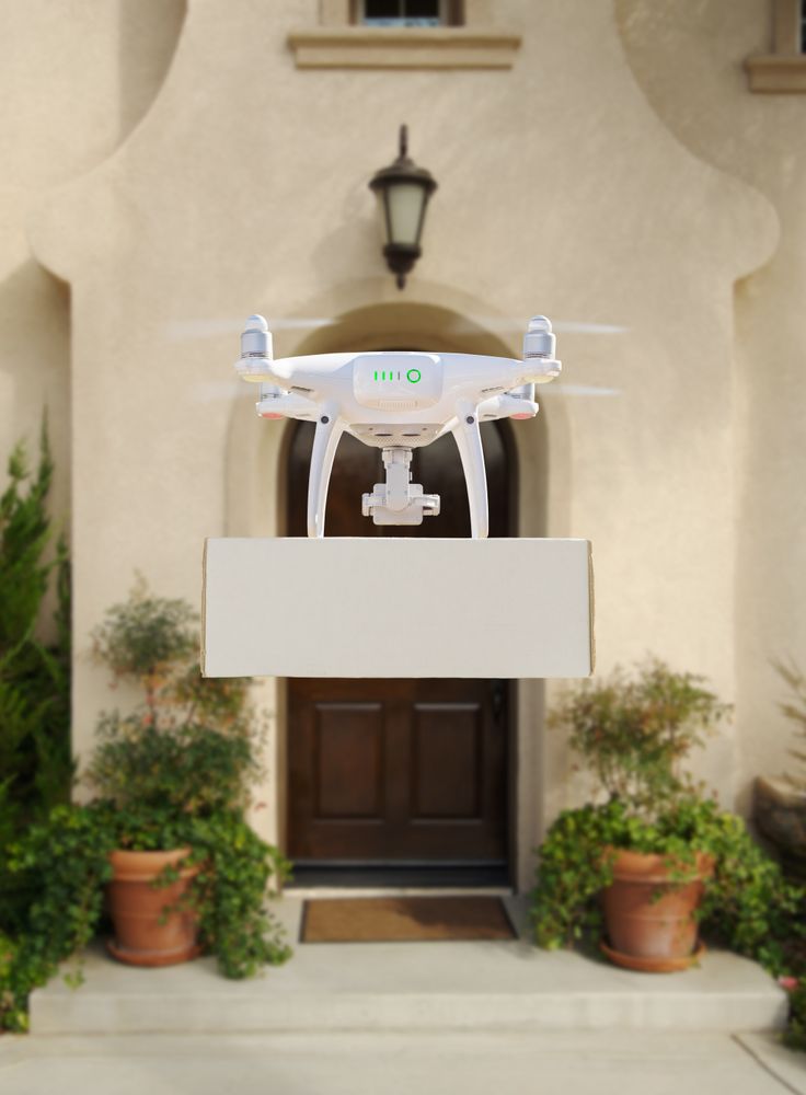 Drone Delivering Package to House Porch