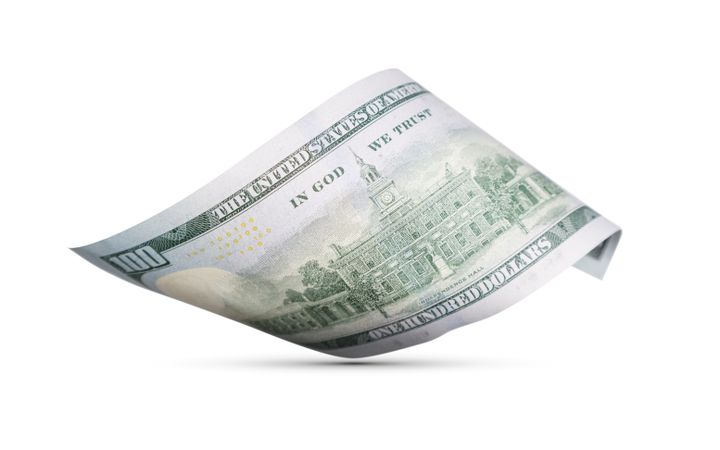 One Hundred Dollar Bill Floating Down To Surface with Drop Shadow
