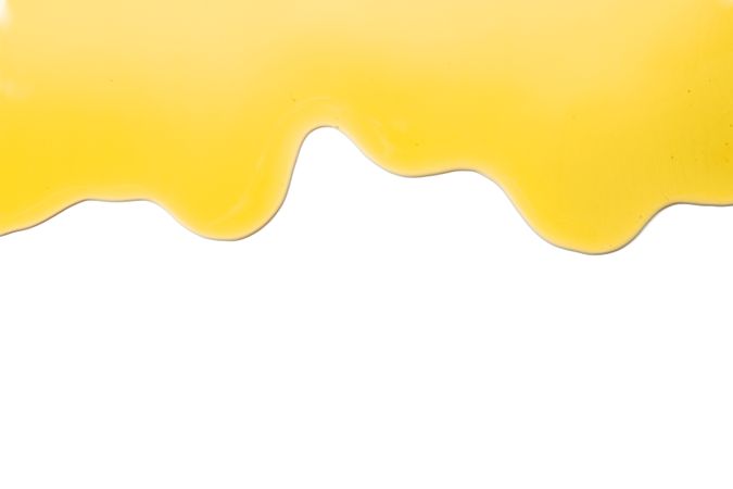 Flow of sweet honey isolated on plain background