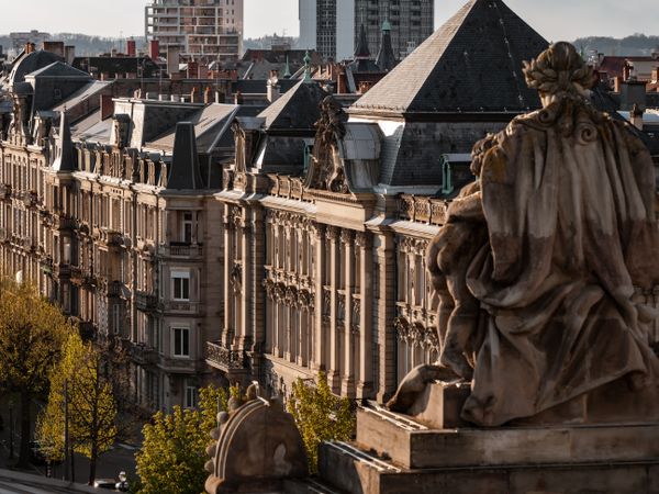 Roofs of the city of Strasbourg. Library building. St Paul's Cathedral.