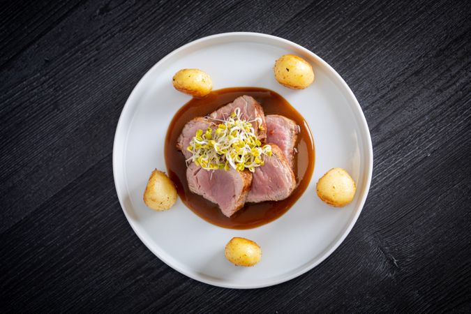 Duroc sirloin with orange ginger soy and potatoes
