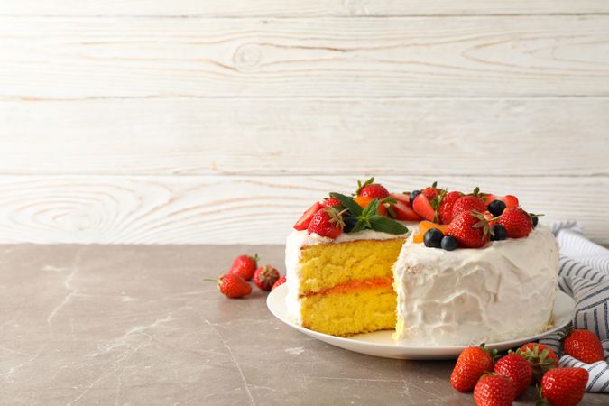 Composition with delicious berry cream cake. Tasty dessert