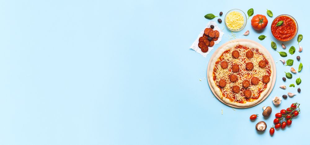 Making pepperoni pizza