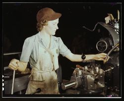 Fort Worth, TX, USA - 1942: Young woman working at Consolidated Aircraft Corp 5rZy75